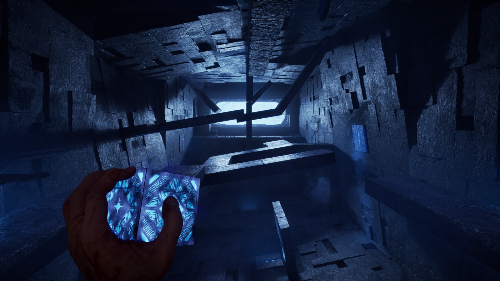 Aidan holds the Genesis Configuration in a shifting Labyrinth chamber in Hellraiser Revival.
