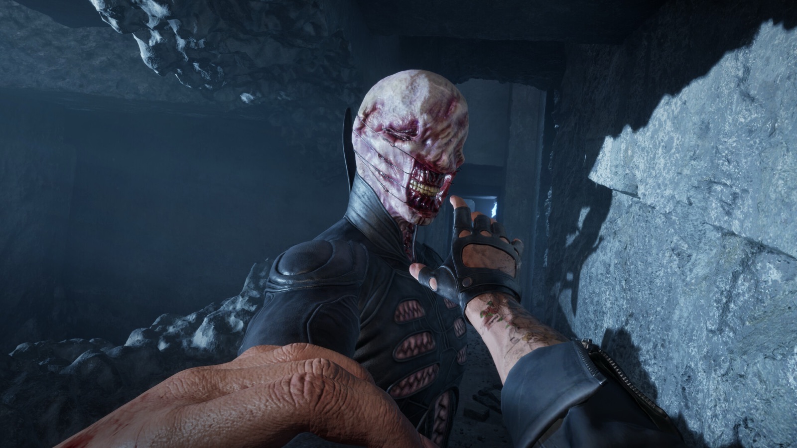 Aidan reaches toward the Chatterer during a close encounter in Hellraiser Revival.